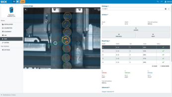 Sick Display SICK vision system shines bright in building of solar panels - SICK ...